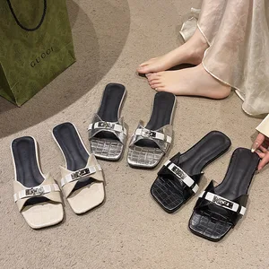 Small Metal Lock slippers Female Summer Wear Outside the New Black Flat One Word Cool Beach slippers