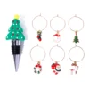 Set albero di Natale rosso con dettagli dorati.