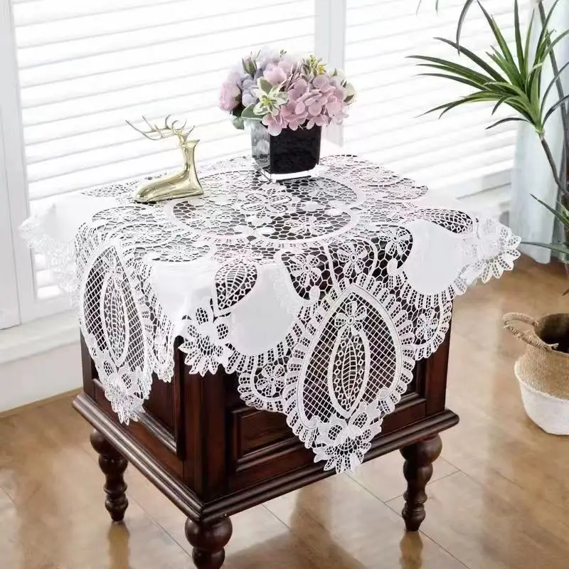 Handembroidered Lace Jacquard Cutwork Tablecloth On The Table
