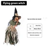 The flying green-clad witch