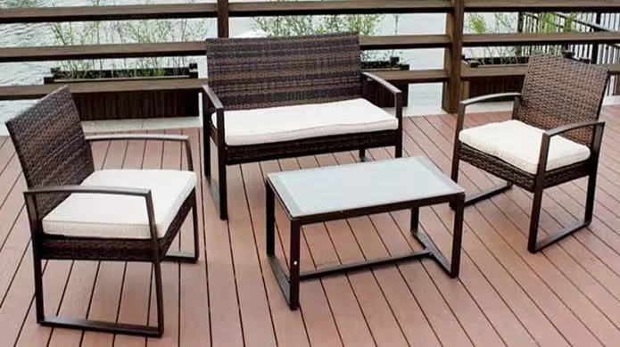 Садовая мебель из ротанга для современного внутреннего двора: стол стулья и диван