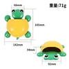 Little turtle toothbrush storage: yellow shell, green feet.