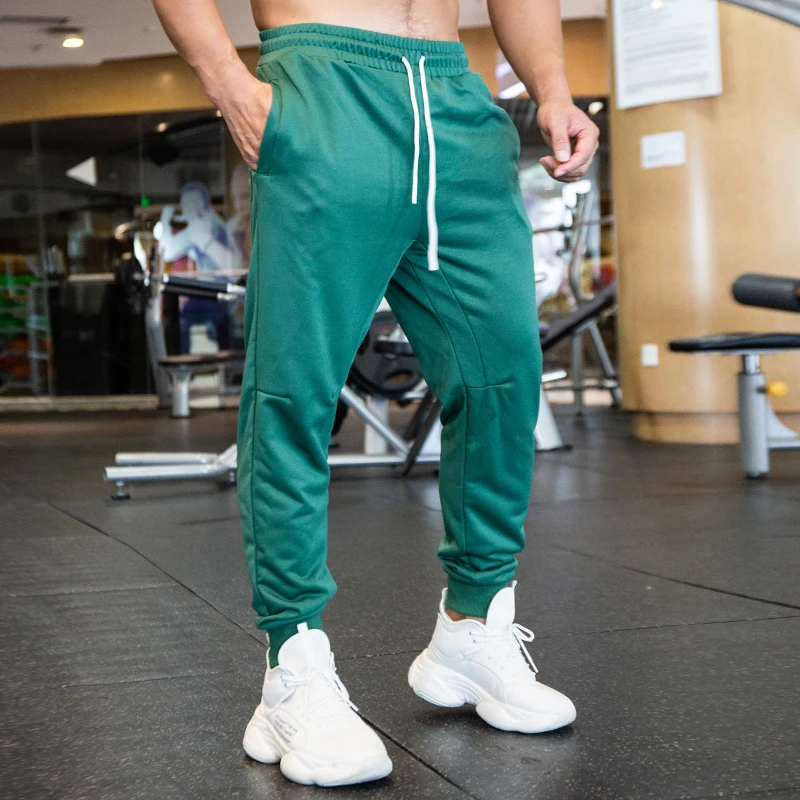 Wholesale high quality 100 polyester jogger pants blank fitness athletic plain men trousers and pants Alibaba