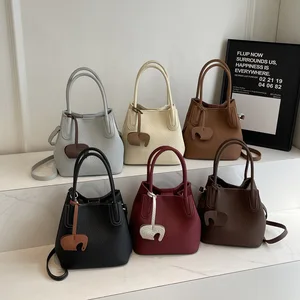 Women's Textured Pu Leather Bucket Bag Fashion Mini Top Handle Tote with Removable Strap Sac With Pendant