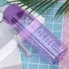 Purple bottle with round cap