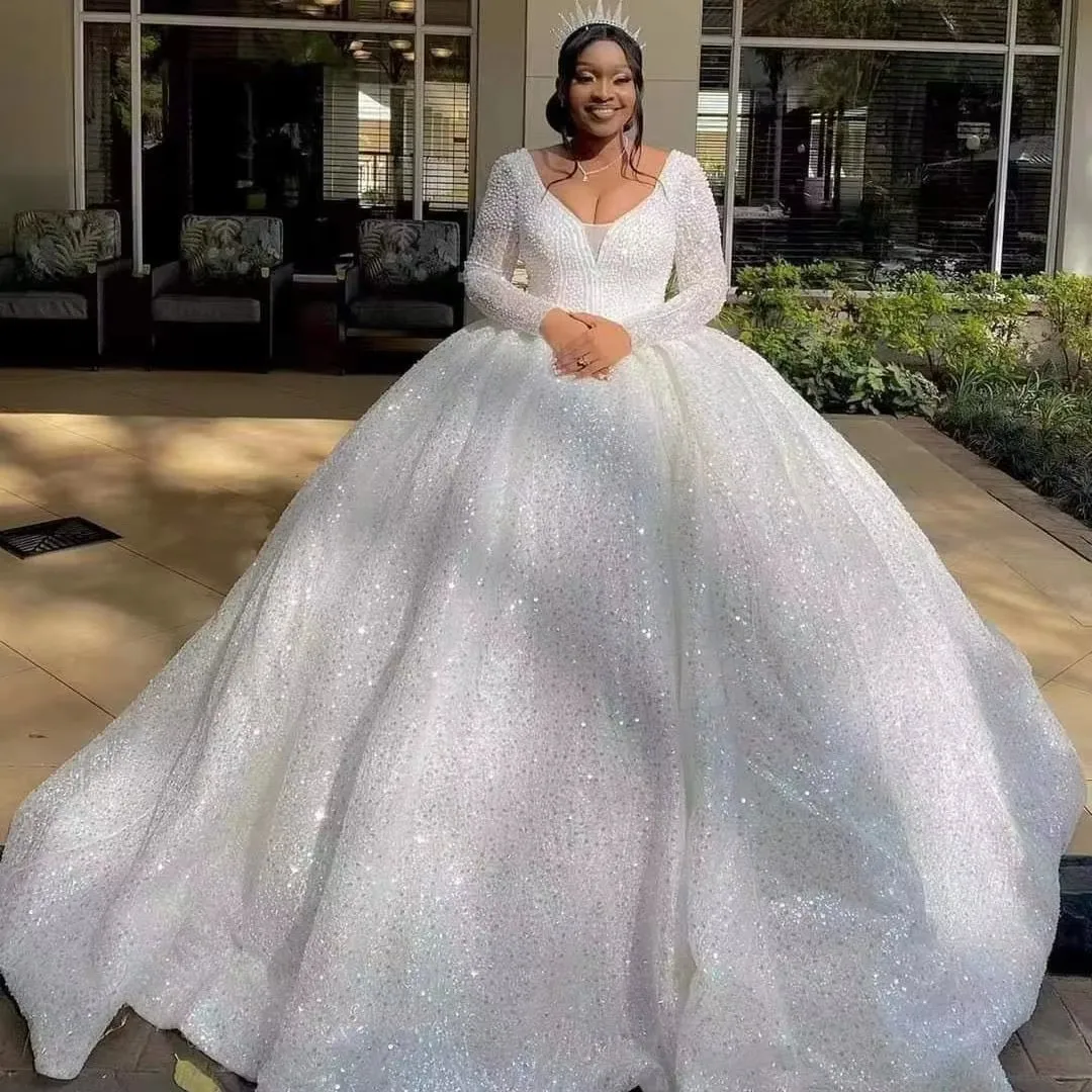 Shop Our Selection of Long Sleeve Sparkling Princess Bridal Gowns