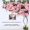 Arbre à fleurs de cerisier coloré avec feuilles vertes