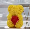 thin yellow bear with red heart with box