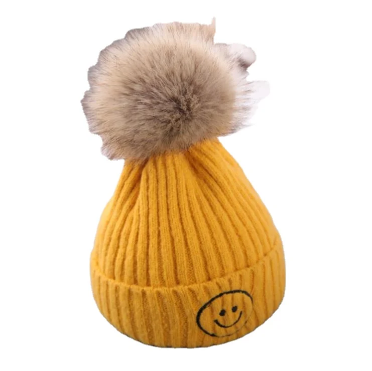 beanie with detachable pom pom