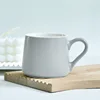 Matte light gray wide-bellied cup