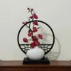 Horizontal screen, small white teapot, rose-red plum blossom