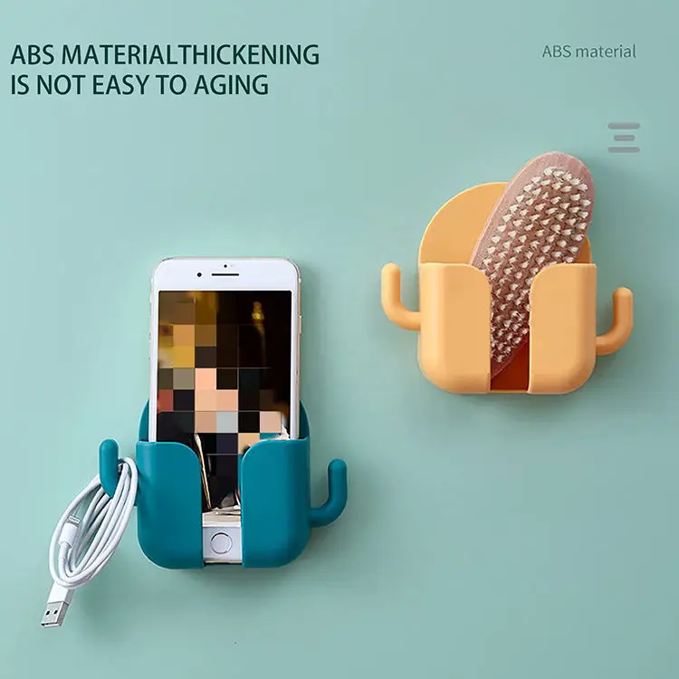 Hversdagslegt vörufyrirtæki: Fjölnota geymsluskápur fyrir vegg, af plasti, með lím til að geyma síma og fjartengdarstýringar