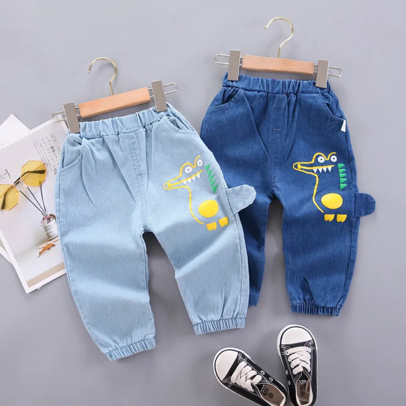 Cute Smiling Baby Girl 1-2 Year Old Wear Casual Denim Pants and White Top  in City Street Outdoors. Looking at Camera Stock Photo - Image of casual,  pants: 242749710
