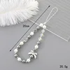K3354 retro beauty head bow phone charm