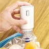 Model A white electric pump, USB rechargeable, with filter.