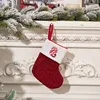 Calcetín navideño con letras bordadas de dibujos animados
