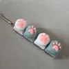Four-button transparent shell - silicone cat paw white and gray