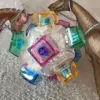 Mélange de douze capuchons de couleur de coque transparente