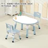 Whiteboard, whale blue color scheme, table, two chairs