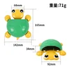 Little turtle toothbrush storage: green shell, yellow feet.