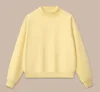 Yellow sweatshirt