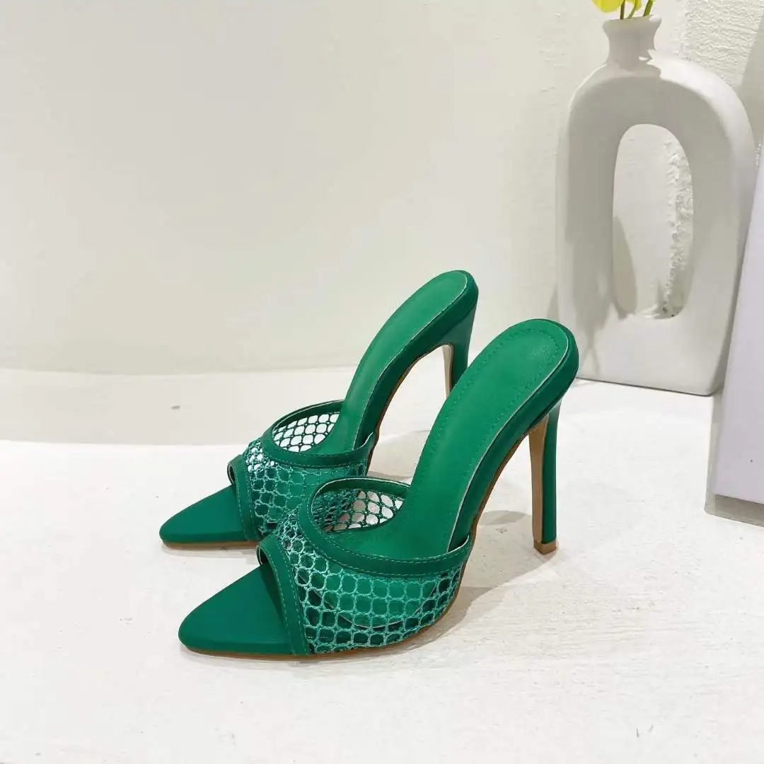 Dark green sandals with small heel and multiple thick straps