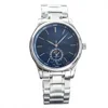 Cadran bleu, lunette argentée, bracelet en acier argenté 5