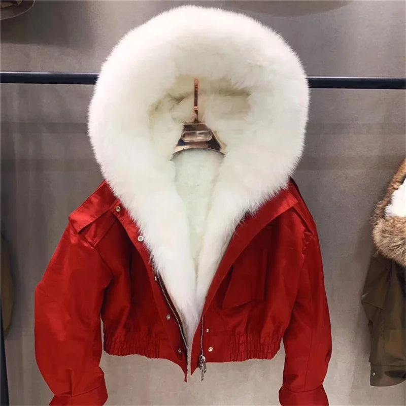 red jacket with white fur hood