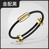 Gold Beads and Black Rope
