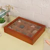 Old-fashioned large twelve-compartment transparent acrylic box