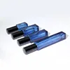Dark blue bottle with black nozzle cover