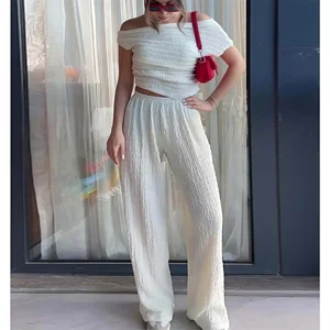 fashion women two piece set Women's Textured Asymmetrical Top and High-Waisted Pants Solid Color 2-Piece Set