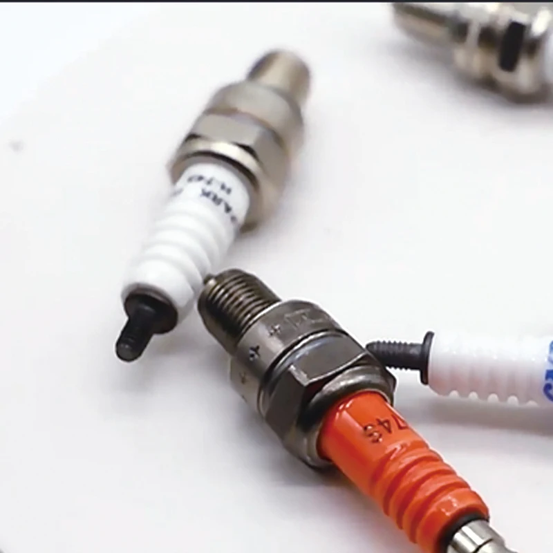 High Quality Bajaj CT100 Spark Plug C7hsa Powerful Resistive Motorcycle Parts with New Condition Box Packed