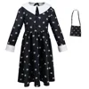Robe et sac imprimés noirs