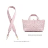 Light pink diamond-shaped crossbody strap