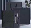 black notebook+pen