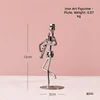 Reed pipe-iron art figurine