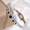 Bracciale in argento con madreperla nera a forma di cuore