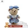 Cream yellow - bear in blue and white checkered dress