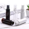 white bottle with transparent sprayer