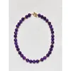 Collana in oro e charoite