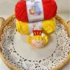 Bollo de niña de palomitas de maíz