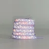 Lacet de chaussure violet poudré réfléchissant motif galaxie étoilée.