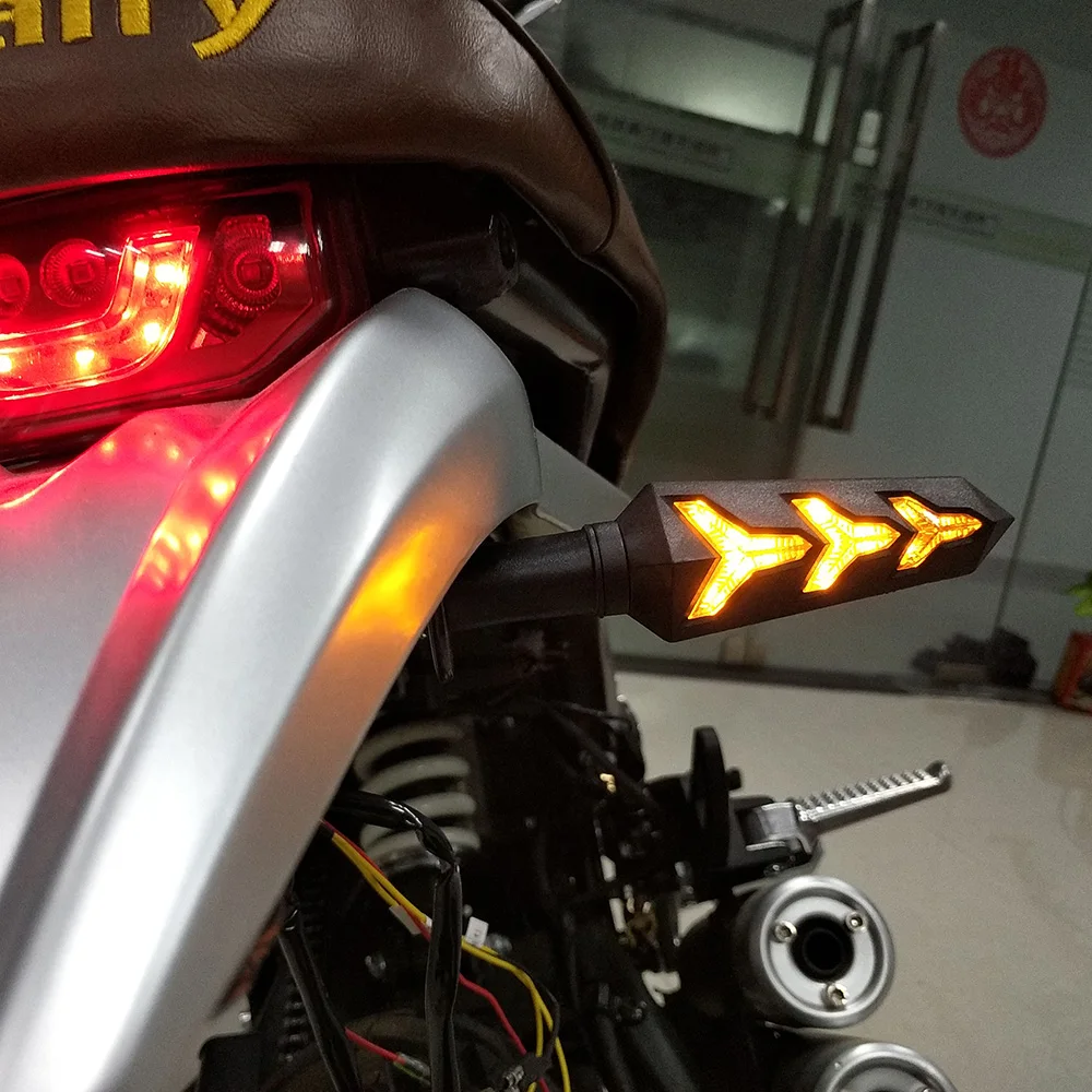 Universal Motorcycle LED Turn Signals Light Flowing Water Flashing Indicator Sequential Tail