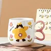 Yellow-clad girl, chubby cup