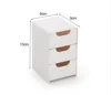 Caja de maquillaje de tres capas.