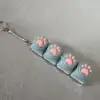 Four-button transparent shell - silicone gray cat paw