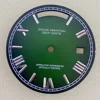 Logotipo 31mm-s - negro verde plata clavo