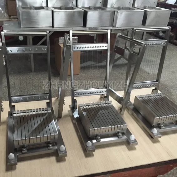 Manual Double Cutting Arm Chocolate Bar Square Grid Cake Cutting Machine  Caramel Cutter Chocolate Guitar Cutter - China Chocolate Cutting Machine,  Chocolate Slicing Machine