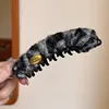 1295 Pinza de Plátano de Felpa Negra y Gris